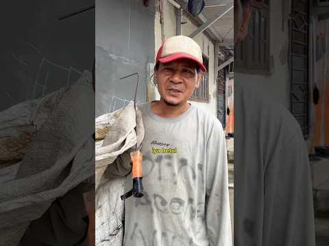 PAK KOMAR PEMULUNG YANG MENGURUS ANAK AUTIS