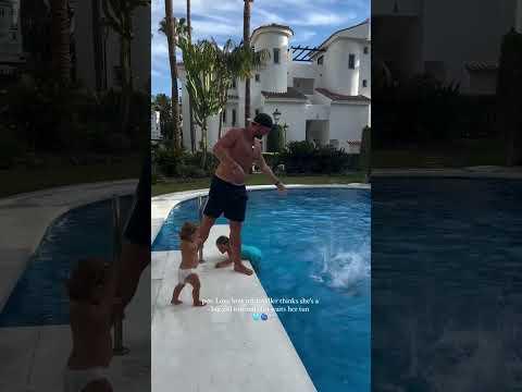 This Toddler Patiently Waits for Her Turn to Jump Into the Pool
